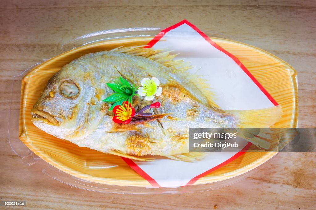 Salt-grilled Sea Bream with Plastic Flower Decoration
