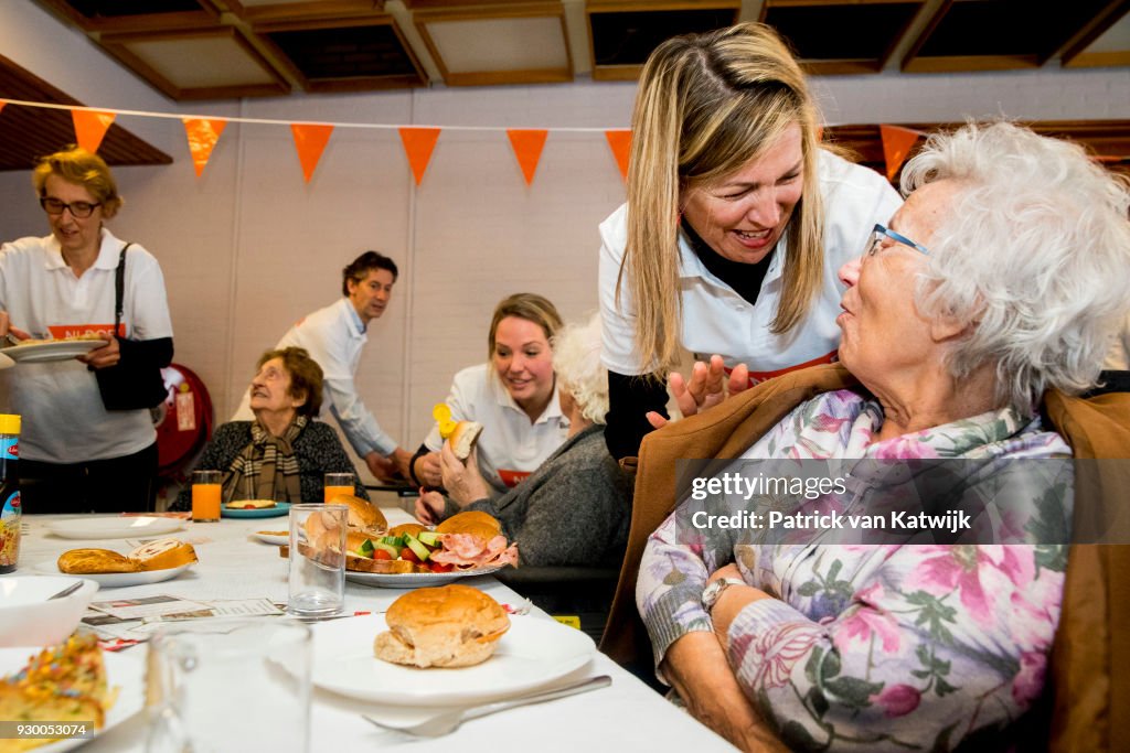 King Willem Alexander Of The Netherlands And Queen Maxima Volunteer During The NL Doet At Pijnacker