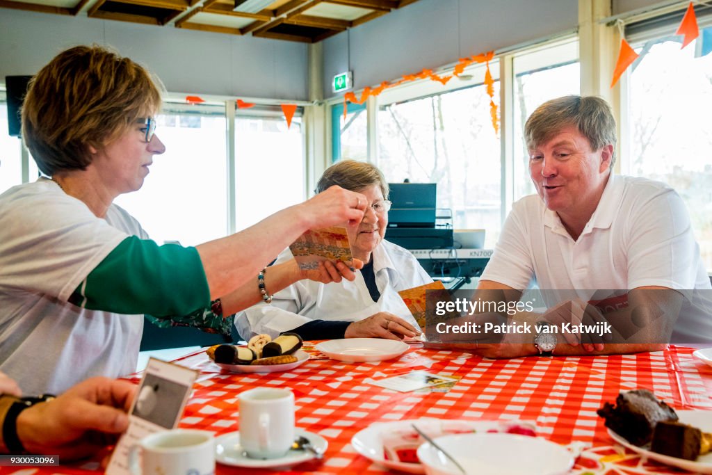 King Willem Alexander Of The Netherlands And Queen Maxima Volunteer During The NL Doet At Pijnacker