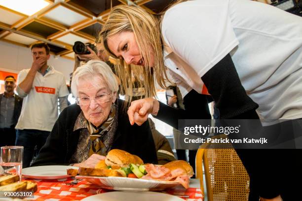 Queen Maxima of The Netherlands volunteers during the NL Doet at residential care centre 't Hofland in Pijnacker on March 10, 2018 in Pijnacker,...