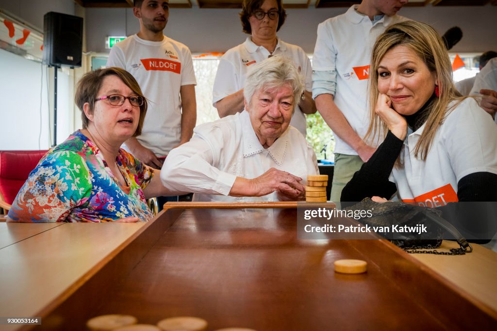 King Willem Alexander Of The Netherlands And Queen Maxima Volunteer During The NL Doet At Pijnacker