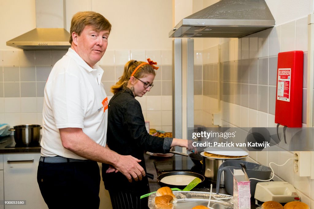 King Willem Alexander Of The Netherlands And Queen Maxima Volunteer During The NL Doet At Pijnacker