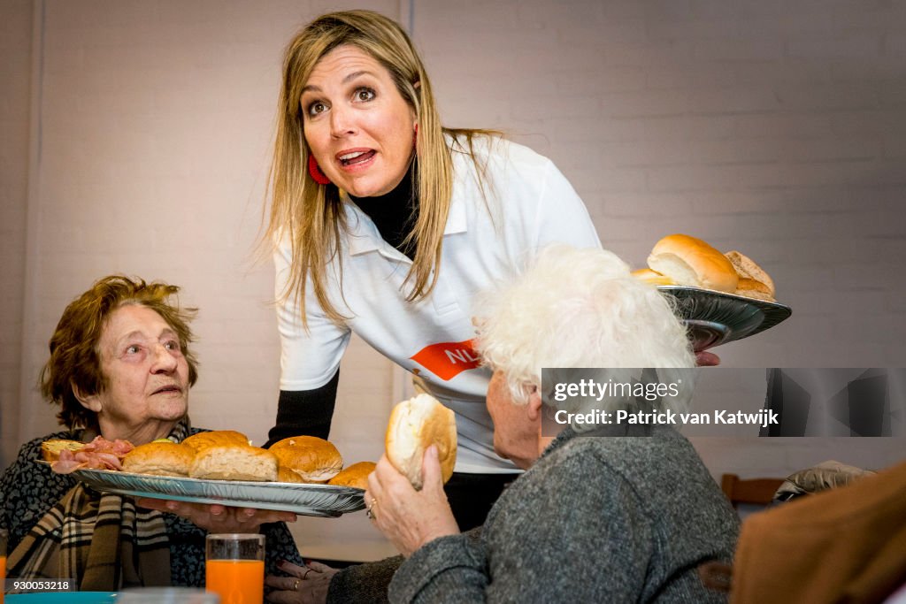 King Willem Alexander Of The Netherlands And Queen Maxima Volunteer During The NL Doet At Pijnacker