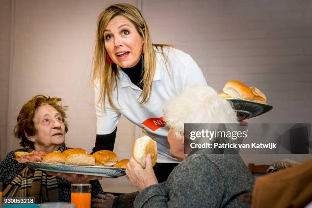 Queen Maxima of The Netherlands volunteers during the NL Doet at residential care centre 't Hofland in Pijnacker on March 10, 2018 in Pijnacker,...