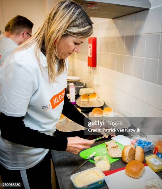 Queen Maxima of The Netherlands volunteers during the NL Doet at residential care centre 't Hofland in Pijnacker on March 10, 2018 in Pijnacker,...