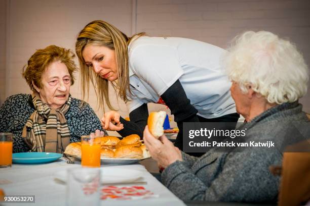 Queen Maxima of The Netherlands volunteers during the NL Doet at residential care centre 't Hofland in Pijnacker on March 10, 2018 in Pijnacker,...