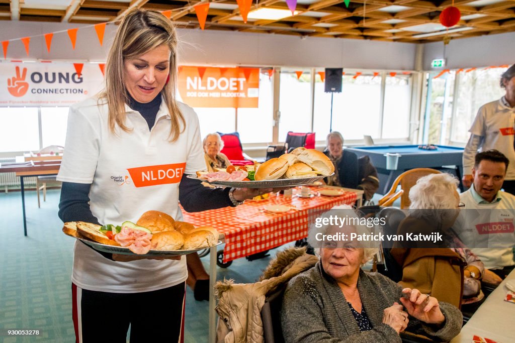 King Willem Alexander Of The Netherlands And Queen Maxima Volunteer During The NL Doet At Pijnacker