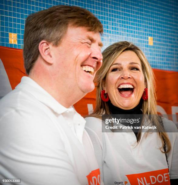 King Willem-alexander of The Netherlands and Queen Maxima of The Netherlands volunteer during the NL Doet at residential care centre 't Hofland in...