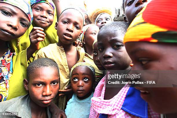 Group of children jostle for position in front of the camera on November 07, 2009 in Bauchi, Nigeria.