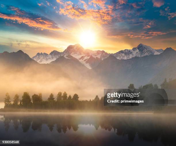 beautiful scenery landscape of the matheson lake fox glacier town southern alps mountain valleys new zealand - lake matheson new zealand stock pictures, royalty-free photos & images