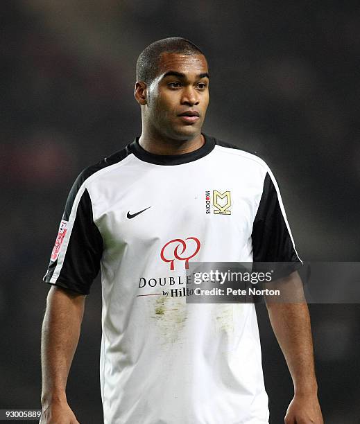 Jermaine Easter of MK Dons in action during the Johnstone's Paint Trophy Southern Area Quarter Final Match between MK Dons and Northampton Town at...