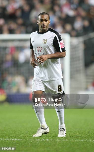 Jermaine Easter of MK Dons in action during the Johnstone's Paint Trophy Southern Area Quarter Final Match between MK Dons and Northampton Town at...