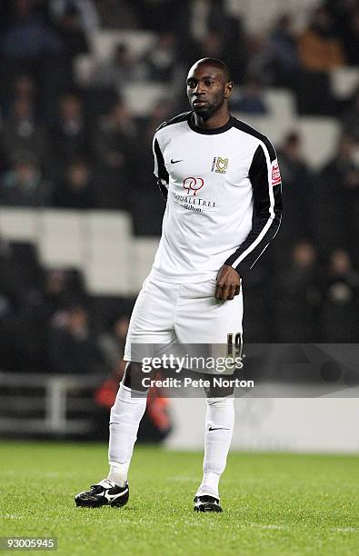 Jabo Ibehre of MK Dons in action during the Johnstone's Paint Trophy Southern Area Quarter Final Match between MK Dons and Northampton Town at...