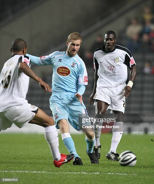 Gary Mulligan of Northampton Town in action during the Johnstone's Paint Trophy Southern Area Quarter Final Match between MK Dons and Northampton...