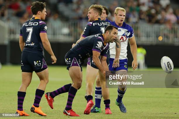 Cameron Smith of the Storm passes the ball during the round one NRL match between the Canterbury Bulldogs and the Melbourne Storm at Optus Stadium on...