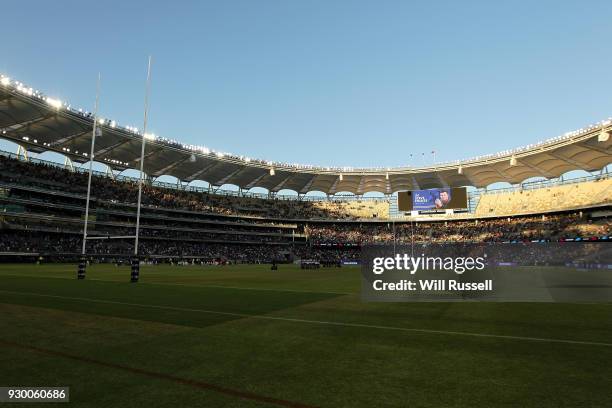 The Bulldogs and Storm players form a huddle in memory of Steve Folkes during the round one NRL match between the Canterbury Bulldogs and the...