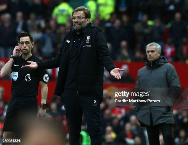 Manager Jurgen Klopp of Liverpool watches from the touchline during the Premier League match between Manchester United and Liverpool at Old Trafford...