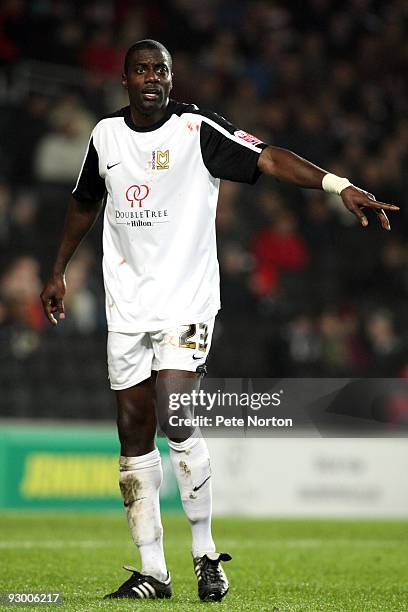 Darren Powell of MK Dons in action during the Johnstone's Paint Trophy Southern Area Quarter Final Match between MK Dons and Northampton Town at...