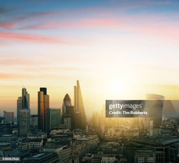 view of the city of london financial district with sun - salesforce tower london stock pictures, royalty-free photos & images