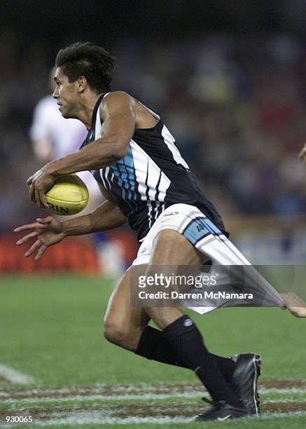 Che Cockatoo-Collins for Port Adelaide is caught by the shorts, in the match between the Essendon Bombers and the Port Adelaide Power, during round...