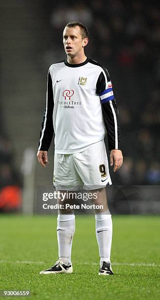 Aaron Wilbraham of MK Dons in action during the Johnstone's Paint Trophy Southern Area Quarter Final Match between MK Dons and Northampton Town at...