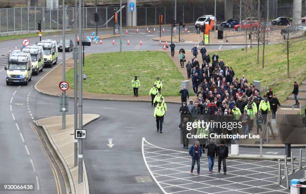 West Ham United fans protest against the West Ham United board escorted by police ahead of the Premier League match between West Ham United and...