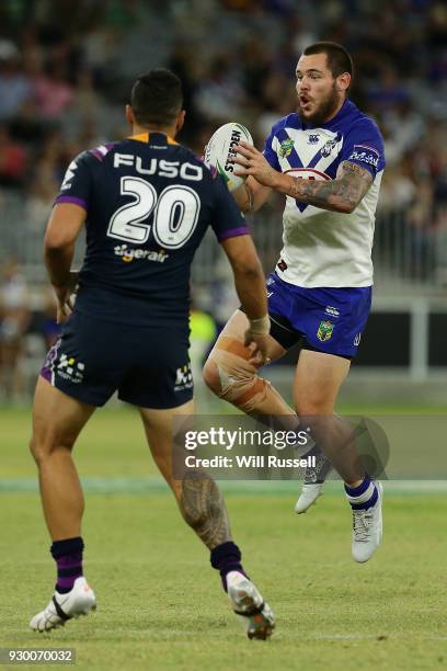 David Klemmer of the Bulldogs controls the ball during the round one NRL match between the Canterbury Bulldogs and the Melbourne Storm at Optus...