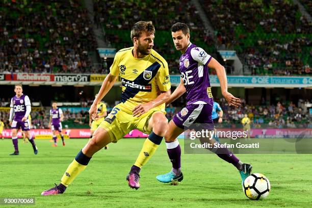 Antony Golec of the Mariners competes for the ball against Joel Chianese of the Glory during the round 22 A-League match between the Perth Glory and...