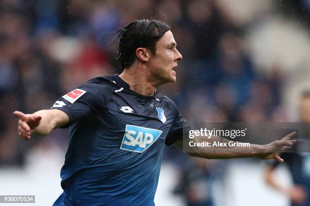 Nico Schulz of Hoffenheim celebrates after he scored a goal to make it 1:0 during the Bundesliga match between TSG 1899 Hoffenheim and VfL Wolfsburg...