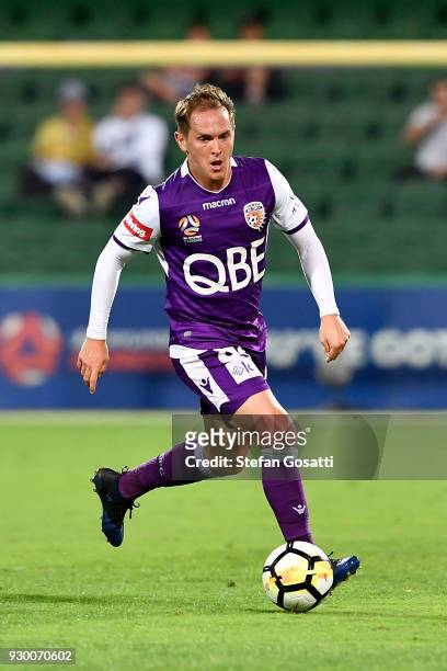 Neil Kilkenny of the Glory runs the ball during the round 22 A-League match between the Perth Glory and the Central Coast Mariners at nib Stadium on...