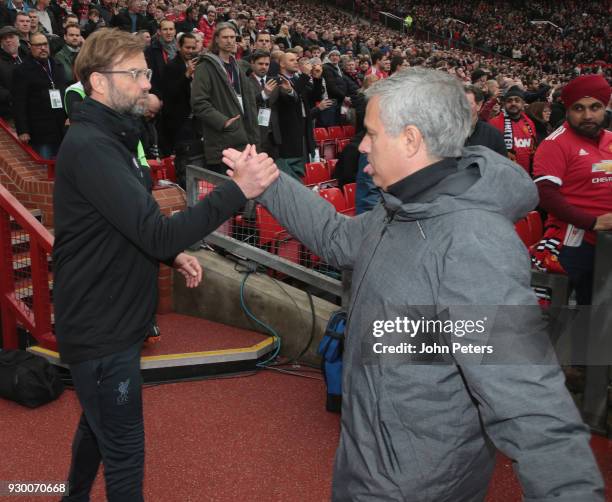 Manager Jose Mourinho of Manchester United shakes hands with Manager Jurgen Klopp of Liverpool ahead of the Premier League match between Manchester...