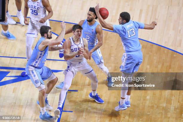 Duke Blue Devils guard Grayson Allen has the ball stolen by North Carolina Tar Heels guard Cameron Johnson during the first half of the ACC...