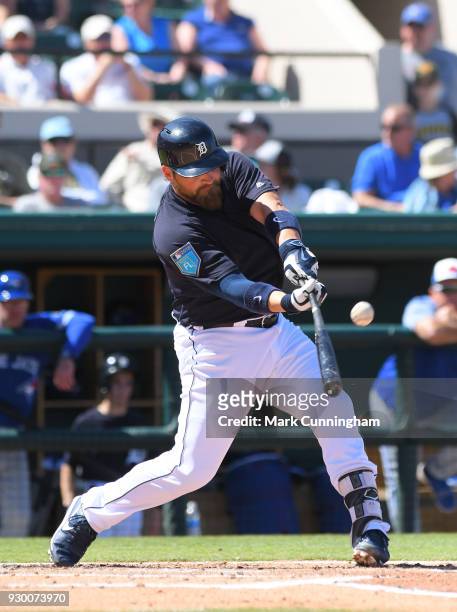 Derek Norris of the Detroit Tigers bats during the Spring Training game against the Toronto Blue Jays at Publix Field at Joker Marchant Stadium on...