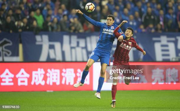 Giovanni Moreno of Shanghai Greenland Shenhua and Hai yu of Shanghai SIPG in action during the 2018 Chinese Super League match between Shanghai...