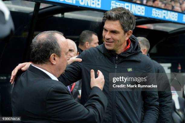 Rafael Benitez, Manager of Newcastle United and Mauricio Pellegrino, Manager of Southampton embrace prior to the Premier League match between...