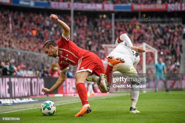 Franck Ribery of FC Bayern Muenchen is challenged by Gotoku Sakai of Hamburg during the Bundesliga match between FC Bayern Muenchen and Hamburger SV...