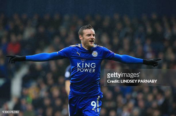 Leicester City's English striker Jamie Vardy celebrates scoring his team's first goal during the English Premier League football match between West...