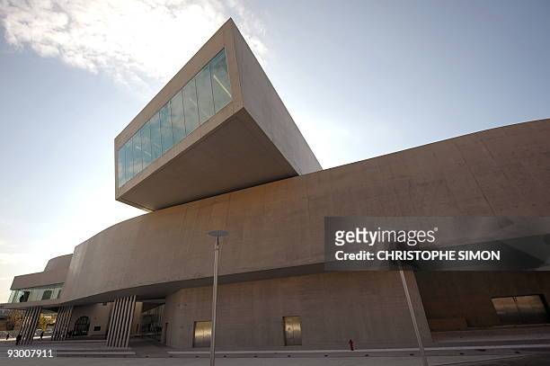 People walk by the National Museum of the XXI Century Arts, the Maxxi, during the architectural preview on the occasion of the completion of the...