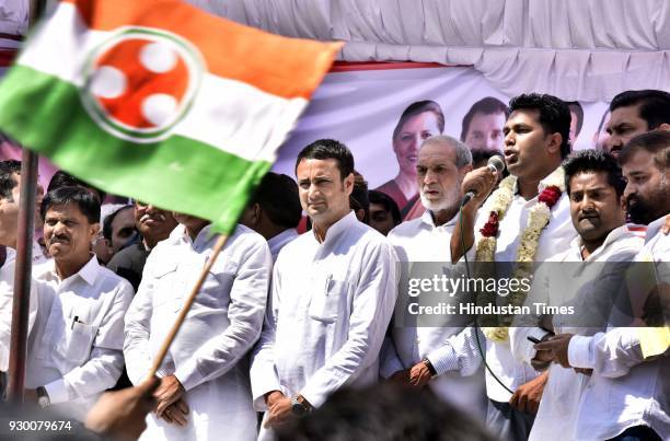 Newly-elected president of the Delhi Pradesh Youth Congress Vikas Chhikara with DPCC president Ajay Maken and Sajjan Kumar address Congress Party...