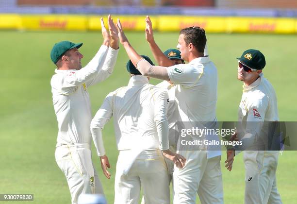 Josh Hazlewood of Australia celebrates the wicket of the Dean Elgar of South Africa during day 2 of the 2nd Sunfoil Test match between South Africa...