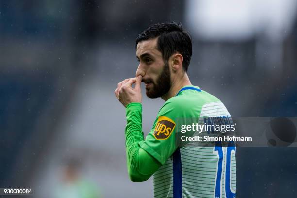 Yunus Malli of Wolfsburg reacts during the Bundesliga match between TSG 1899 Hoffenheim and VfL Wolfsburg at Wirsol Rhein-Neckar-Arena on March 10,...