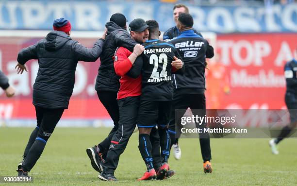 Head coach Steffen Baumgart of Paderborn and his team show their delight after winning the 3.Liga match between FC Hansa Rostock and SC Paderborn 07...