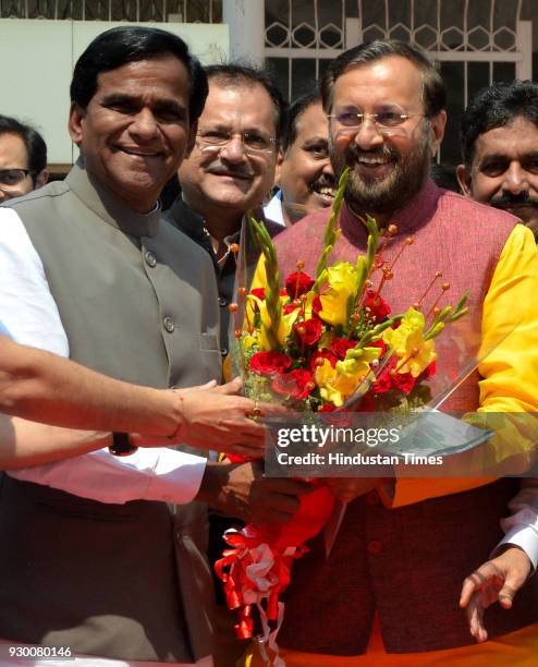 Raosaheb Danve and Girish Bapat welcome BJP leader Prakash Javadekar to fill his nomination for Rajya Sabha during the budget session at Vidhan...