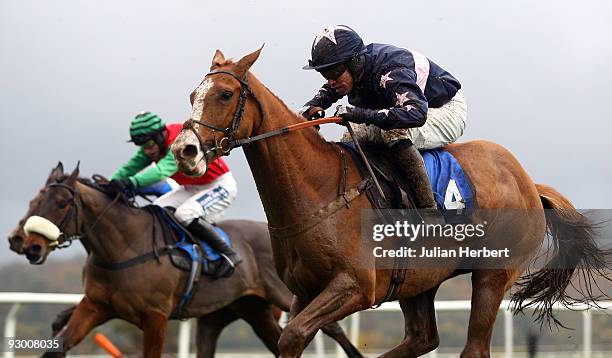 Timmy Murphy and Don't Panic get the better of the Daryl Jacob ridden Consulate to land The Morgan Ashurst Novices' Hurdle Race run at Taunton...