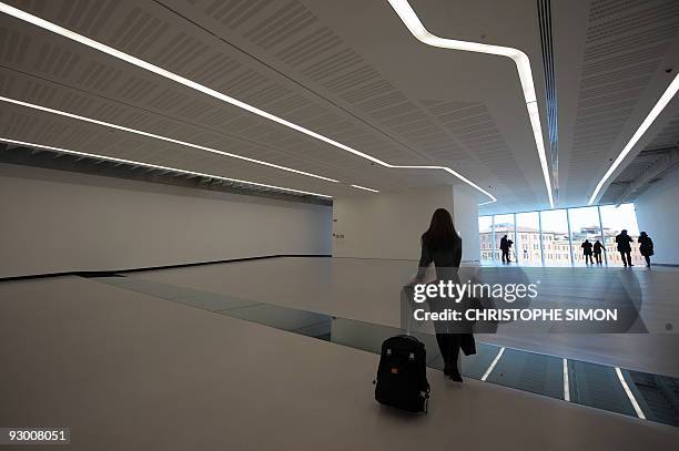 People walk in the silent room of the National Museum of the XXI Century Arts, the Maxxi, during the architectural preview on the occasion of the...