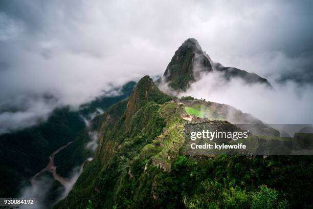 machu picchu in the fog, cuzco, peru - peru stock pictures, royalty-free photos & images