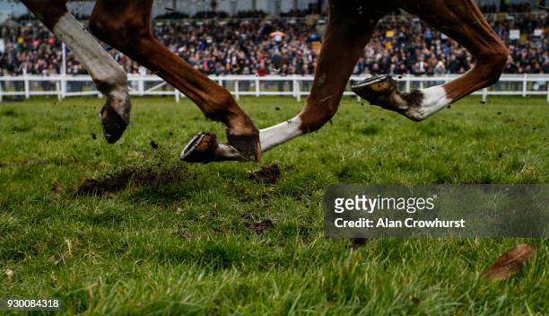 General view as a runner kicks up the soft going at Sandown Park racecourse on March 10, 2018 in Esher, United Kingdom.