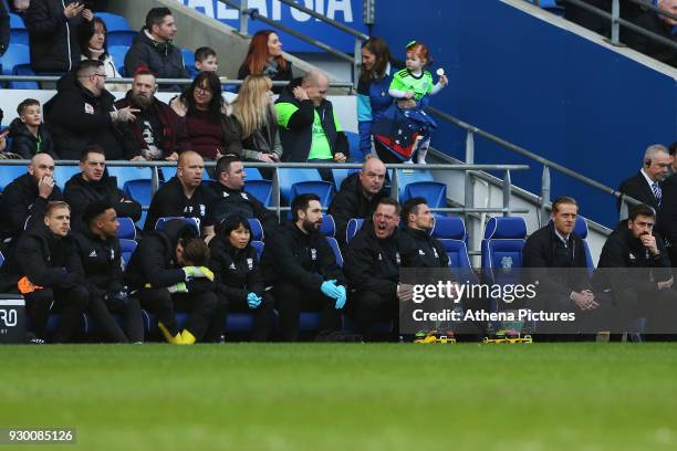Birmingham City manager Gary Monk sits with a dejected bench after Craig Bryson of Cardiff City scores his sides second goal of the match during the...