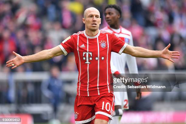 Arjen Robben of Bayern Muenchen celebrates after he scored a goal to make it 4:0 during the Bundesliga match between FC Bayern Muenchen and Hamburger...