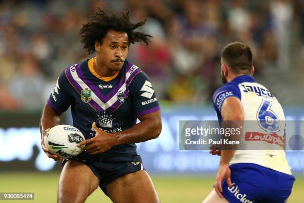 Felise Kaufusi of the Storm runs the ball during the round one NRL match between the Canterbury Bulldogs and the Melbourne Storm at Optus Stadium on...